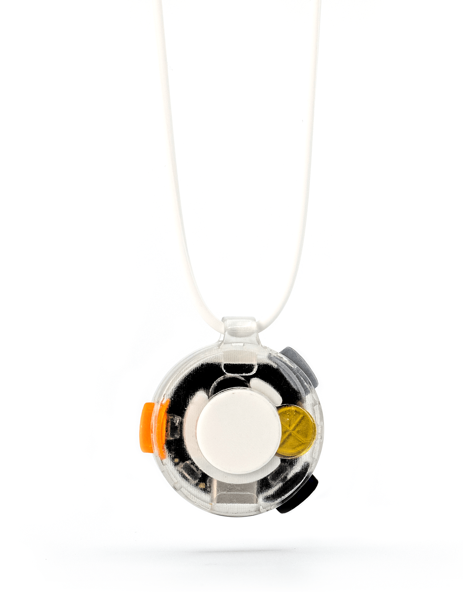 VOX hanging on its fine cord: a small round device in a clear housing, its pale capture button, orange side control and skin-contact microphone visible through the case, lit against a white field.
